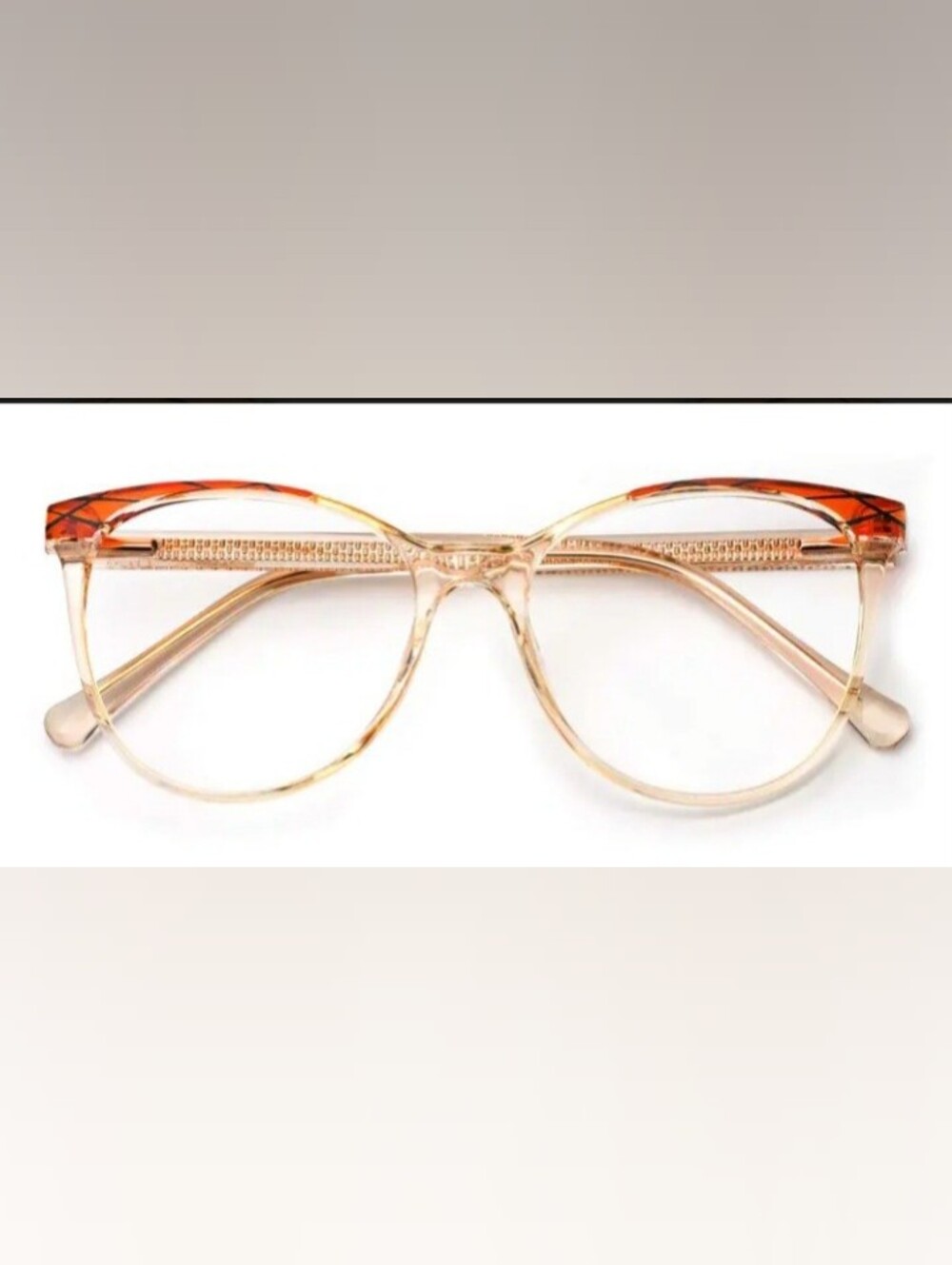 Women's Clear Champagne Frame Glasses with Amber Accents oval cat-eye